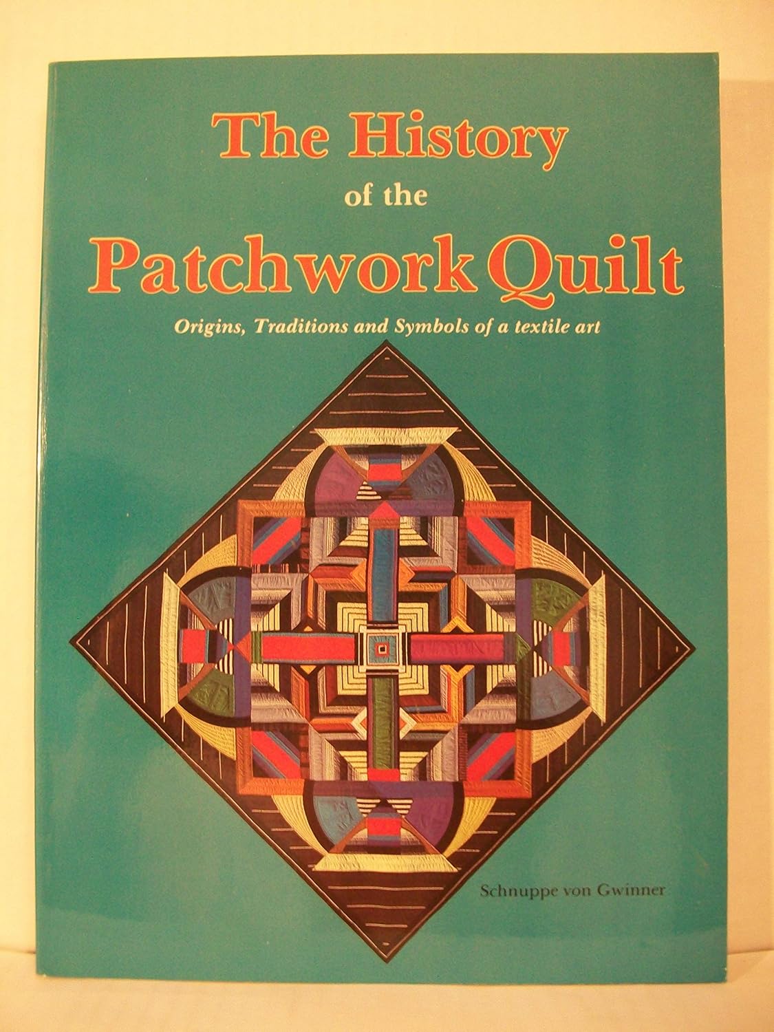 ler totalmente The History of the Patchwork Quilt: Origins, Traditions and Symbols of a Textile Art